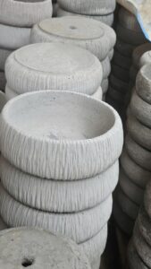 chậu xi măng miệng loe trồng hoa giấy