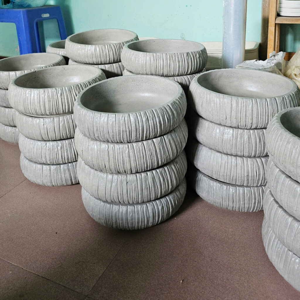 chậu xi măng trồng cây
