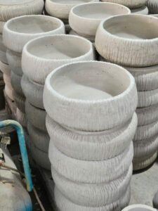 chậu xi măng hình oval trồng hoa mười giờ