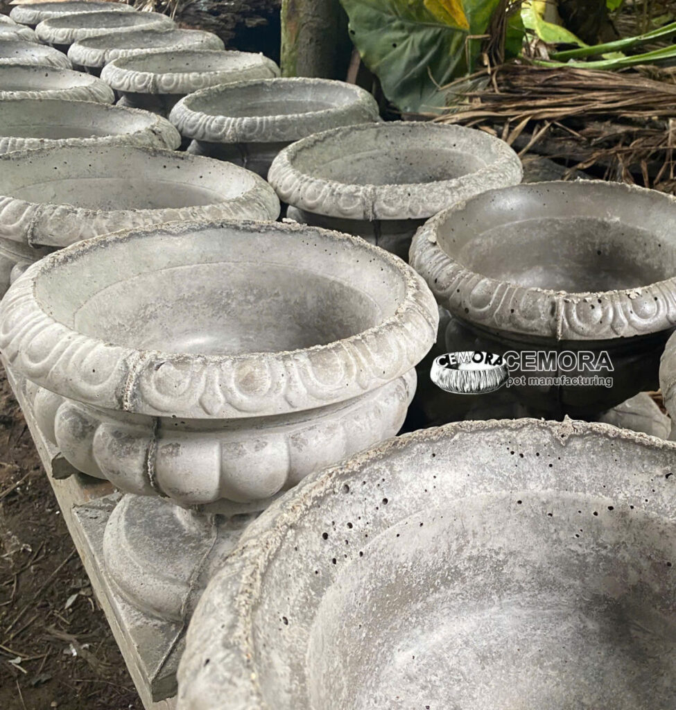 chậu xi măng lỗ thoát nước lớn dễ ra rễ